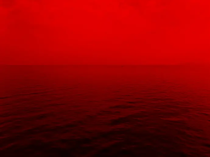 photo of ocean with red lights